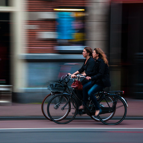 2 women cycling