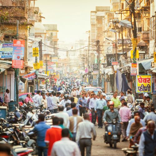 Pedestrians walk in a street