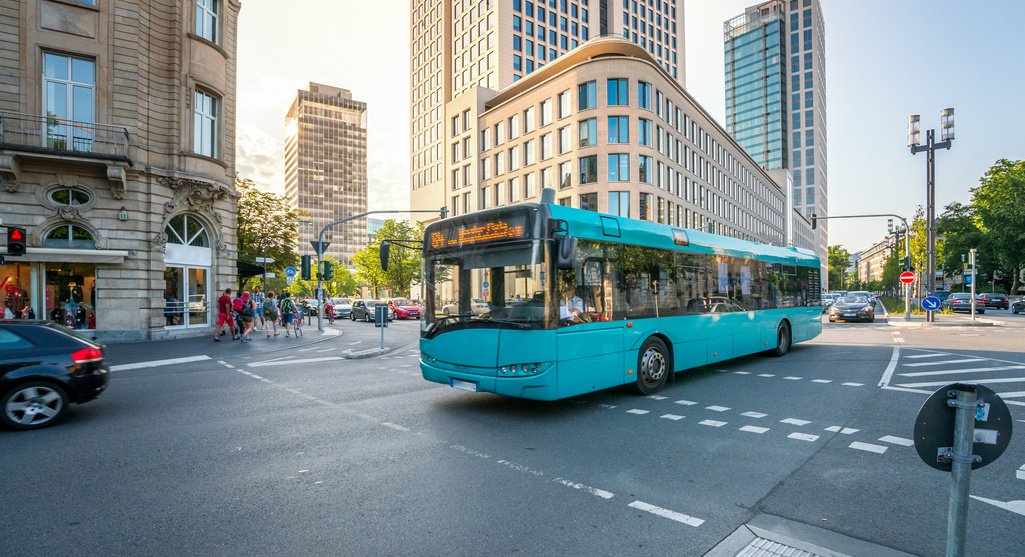 A turquoise bus in Frankfurt